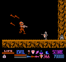 312955-wizards-warriors-nes-screenshot-a-jumping-and-bone-throwing